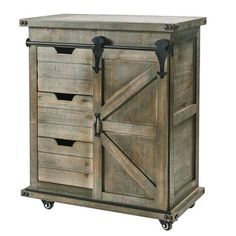 a wooden cabinet with three drawers on wheels