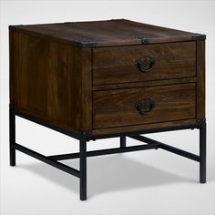 a wooden table with two drawers on one side and an iron base on the other