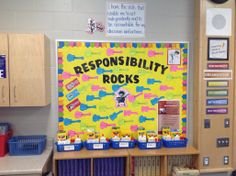 a bulletin board with the words responishment rocks on it in front of a classroom desk