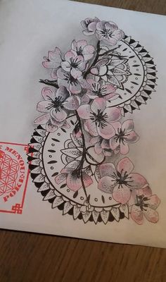 a drawing of some flowers on a piece of paper