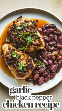 a white plate topped with chicken and beans