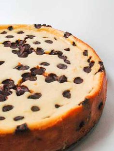 a chocolate chip cheesecake on a white plate