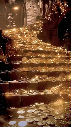 many candles are lit up on the steps