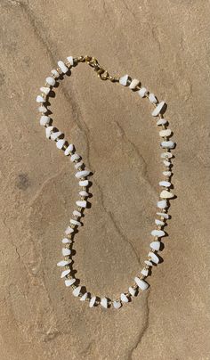 Beautiful beaded necklace containing gorgeous moonstone gemstone chips and complimented with tiny gold glass miyuki seed beads Fastenings are gold plated An ideal necklace for summer As each item is made to order and the materials are natural the size/shape colour of the gemstones may differ slightly As there are small parts please keep away from young children as they may be a choking hazard To avoid damage please don't get wet, please remove before showering, swimming or sleeping Many thanks for visiting my Etsy store, I hope you have a lovely day *all orders come with one jewellery pouch, if you require any additional they are available in my store for £1.00 Chips Necklace, Dainty White Beaded Necklaces With Gemstone Beads, White Beaded Dainty Crystal Necklace, Dainty White Beaded Crystal Necklace, White Dainty Crystal Necklace With Natural Stones, Dainty White Crystal Necklace With Natural Stones, White Bohemian Crystal Necklace With Stones, White Bohemian Crystal Necklace, Gold Beaded Moonstone Necklaces