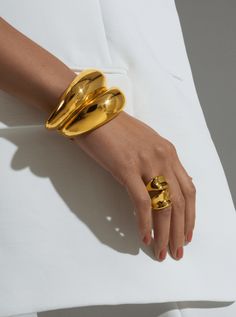 Buy Sirena Cuff for only ₹12,500.00 at MISHO! Timeless Gold Metal Cuff Bracelet, Timeless Gold Cuff Bracelet With Polished Finish, Yellow Gold Cuff Jewelry For Party, Gold Hand Cast Fusion Jewelry, Hand Cast Gold Fusion Jewelry, Gold Cuff Jewelry With Polished Finish, Elegant Hand-cast Cuff Jewelry, Unique Yellow Gold Cuff Bracelet For Formal Occasions, Unique Gold Cuff Bracelet