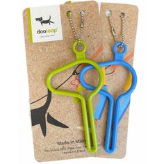 two pairs of scissors sitting on top of each other