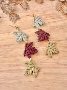 Polymer Clay Fall Themed Earrings Trio of maple leaves in sage green, eggplant, and green  Nickel free gold ball studs  Lightweight Fall Themed Polymer Clay Earrings, Polymer Clay Fall, Green Eggplant, Fimo Ideas, Earrings Fall, Fall Earrings, Maple Leaves, Autumn Theme, Leaf Earrings