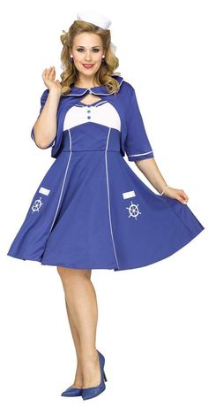 a woman dressed in a sailor costume posing for the camera