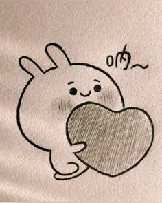 a drawing of a bunny holding a heart