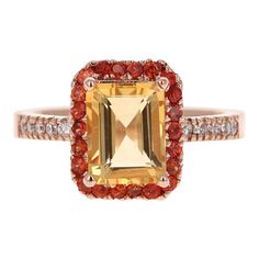 This gorgeous ring has a beautiful Emerald Cut Citrine Quartz weighing 2.23 Carats and is surrounded by a Halo of 22 Round Cut Orange Sapphires weighing 0.50 Carats. Along the shank of the ring are 10 Round Cut Diamonds that weigh 0.18 Carats (Clarity: SI2, Color: F). The total Carat weight is 3.35 Carats.  It is set in 14K Rose Gold and weighs approximately 4.9 grams. This ring is a size 7  Exact dimensions for this item are unknown. Please reach out in the seller Q&A for any questions on measu Cut Orange, Sparkling Jewelry, Ring Rosegold, Gorgeous Ring, Razzle Dazzle, Jewelry Accessories Ideas, Engagement Ring Sizes, Orange Sapphire, Sapphire Diamond Ring