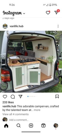 an instagramted photo shows the inside of a van with its doors open and shelves in place