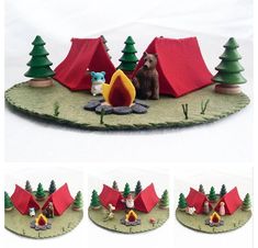 there is a miniature camp site with tents and animals around it, including a dog sitting in the fire pit