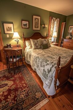 a bedroom with green walls and wooden floors