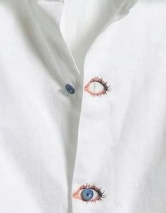 an eye print on a white shirt