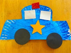 a paper plate shaped like a truck with stars on it