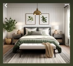 a bedroom with white walls and green bedding in the center, along with two framed pictures on the wall