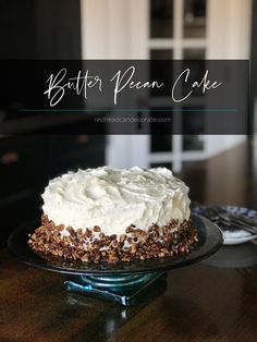 a close up of a cake on a plate with the words butter pecan cake