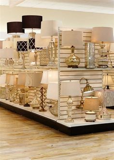 a room filled with lots of different types of lamps