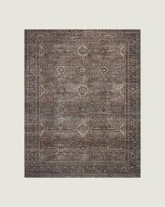 an area rug with brown and beige colors