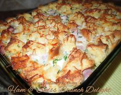 a casserole dish with ham and swiss brunch delight