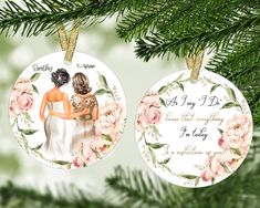 two personalized christmas ornaments hanging from a pine tree with the names of bride and groom