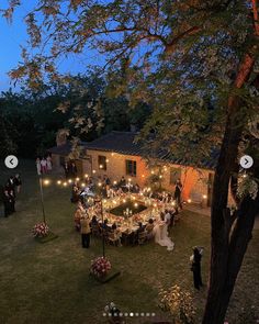 an aerial view of a wedding reception in the evening