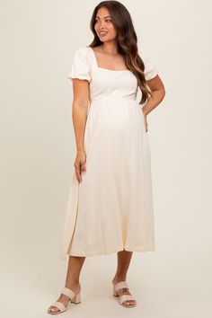 Ivory Puff Sleeve Linen Maternity Midi Dress Feminine Cream Midi Dress With Square Neck, Maternity Square Neck Dress For Spring, Feminine Cream Square Neck Midi Dress, Cream Flowy Empire Waist Dress, Casual Short Sleeve Maternity Midi Dress, Fitted Square Neck Maternity Dress, Spring Maternity Cream Dress, Spring Maternity Dress With Square Neck, Casual White Maternity Midi Dress