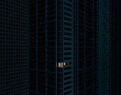 two tall buildings in the middle of a city at night with one lit up window