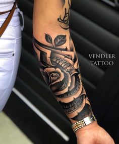 a person with a tattoo on their arm