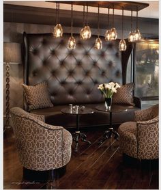 a living room filled with furniture and lights