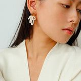 Bow Dance Metal Lava Petite Bow Pearl Earrings
    
    
    
      – floysun