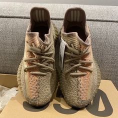 Was Released By The Footwear Giant In Collaboration With Kanye West In December 2020. Featuring A Predominantly Neutral Palette Of Colors. A Brew Of Tans, Beiges, And Browns, The “Sand Taupe” Displays All Three Of The Shades On Its Multi-Directional Woven Primeknit Design Beneath The Side Monofilament Stripe. The Top Of The Shoe Features A Muted Hue Of Orange For A Subtle But Welcoming Pop Of Color. A Semi-Translucent Ribbed Brown Midsole Houses Adidas Boost Cushioning For Unparalleled Comfort. Yeezy Mx Oat, Yeezy Slides Desert Sand, Yeezy 500 Black, Yeezy 350 Salt, Adidas Yeezy 500 Clay Brown, Yeezy Cream White, Yeezy 350 V2 Black, Adidas Yeezy 350 V2, Adidas Yeezy 350