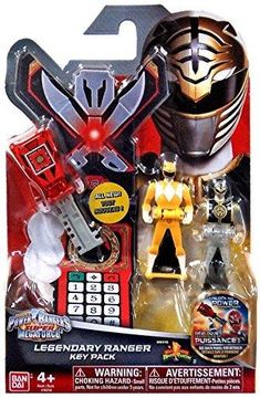 the power rangers action figure has a calculator in it's hand and is packaged