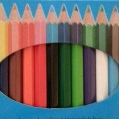 a box of colored pencils sitting on top of each other