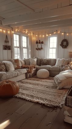 a living room filled with furniture and lots of lights