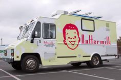 an ice cream truck parked in a parking lot