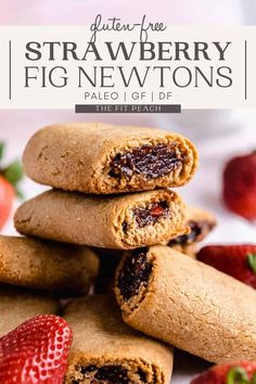 strawberry fig newtons stacked on top of each other with strawberries in the background