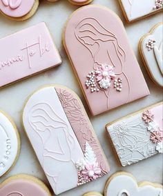 decorated cookies and cookie cutters on a table