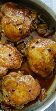 chicken with mushrooms and sauce in a pan