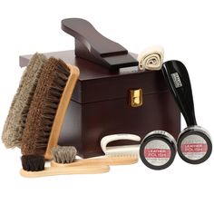 PRICES MAY VARY. The quality shoe shine box kit comes with a foot rest Comes with brushes, daubers, cloths, polish, shoe horn and more A truly unique shine kit. This shoe shine kit comes packed with all the professional tools to effectively shine leather footwear. This kit includes : 2 Professional Horsehair Shine Brushes 2 Horsehair Daubers 1 Suede Nylon Bristle Brushes 2 Shine Cloths 1 Jar of Black Polish Made in USA. 1 Jar of Brown Polish Made in USA. 1 Black Shoe Horn. 1 and the executive va Shoe Shine Box, Shoe Shine Kit, Leather Footwear, Black Shoe, Shoe Shine, Shoe Horn, Black Polish, Professional Tools, Horse Hair