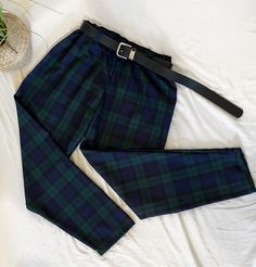 👖 These green tartan trouser is made using cotton blend material (polyviscose) These long trousers have a classic and vintage look thanks to the rich plaid patterns. Put on these relaxed trousers and you'll be ready to take on the world. They are ideal for matching shirts and T-shirts and are also ideal for weekend casual wear. ✅ MEASUREMENTS: * Hip: 36 waist: 24 - size 4 * Hip: 36 waist: 25 - size 6 * Hip: 38 waist: 26.5 - size 8 * Hip: 40 waist: 28 - size 10 * hip: 42.5 waist:30 - size 12 * Hip: 43.5 waist: 31.5 - size 14 * Hip: 45 waist 32.5 - size 16 * Hip: 46 waist: 33.5 - size 18 ✅ FEATURES: ⦿ Made using cotton blend ⦿ A classic and vintage look ⦿ Ideal for matching shirts ⦿ A relaxed fit for men and women  ✅ SPECIFICATIONS: ⦿ Item Type: Tartan Trouser ⦿ Material: Cotton Blend ⦿ Sty Plaid Pants Outfit, Tartan Trousers, Tartan Clothing, Tartan Pants, Check Pants, Trouser Outfit, Green Tartan, Relaxed Trousers, Womens Trousers