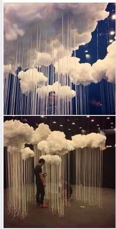 two pictures of people standing in front of clouds hanging from the ceiling and one is taking a photo