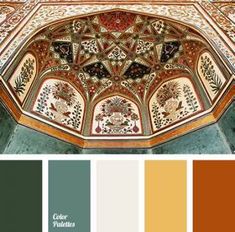 the ceiling is painted in shades of brown, green and beige with an intricate design