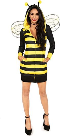 a woman in a bee costume posing for the camera