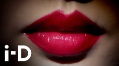 a woman's lips with bright red lipstick on the top and bottom part of her face