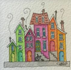 a drawing of houses with bicycles on the street