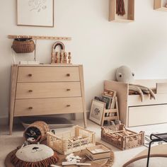 a living room filled with lots of furniture and decor on top of carpeted flooring