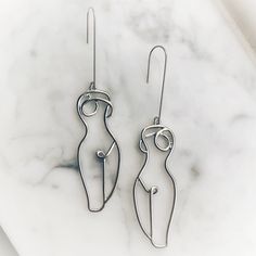 Silver Tone Metal Nude Naked Abstract Art Body Silhouette Lady Female Woman Goddess Feminism Feminist Dangle Drop Whimsical Statement Earrings. Female Body Silhouette, Woman Goddess, Body Silhouette, Silhouette Earring, Art Body, Women Art, Female Body, Female Art, Jewelry Art