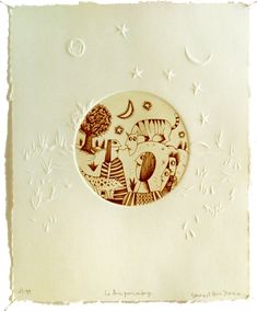 a white plate with an image of two cats on it and stars in the background