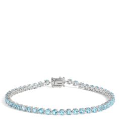 Punch up your bracelet stack with the beautiful hue of blue topaz gemstones set in glimmering 14k yellow gold. This bracelet is endlessly versatile and effortless to style for any occasion. It showcases 49 round cut blue topaz gemstones to add the perfect pop of color to your everyday favorites. Blue Bracelet Stack, Blue Topaz Gemstone, Blue Tourmaline, Long Blonde, Long Blonde Hair, Tourmaline Gemstone, Topaz Gemstone, Blue Bracelet, Metal Bracelets